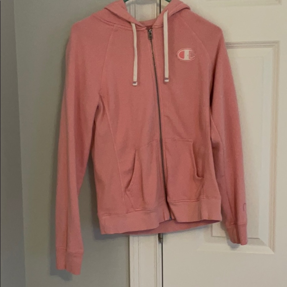 Pink champion zip up sweatshirt.